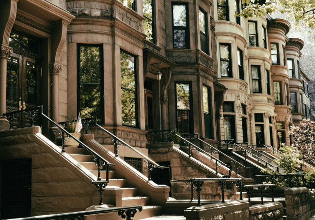 Row of brownstones in Park Slope Brooklyn on an autumn morning. NYC.