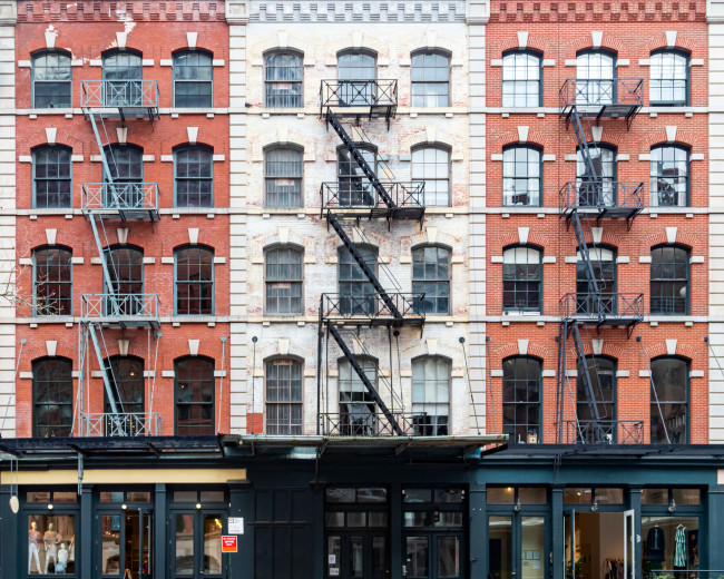 Exterior view of historic brick buildings along Duane Street in the Tribeca neighborhood of New York City NYC