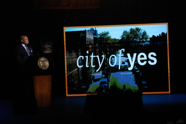 New York City Mayor Eric Adams addresses a crowd gathered at the historic Apollo Theater in Harlem on Thursday for his State of the City address.