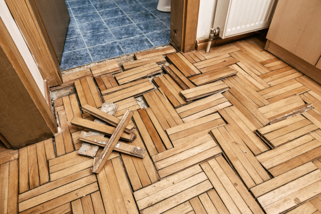 Flood damaged parquet floor