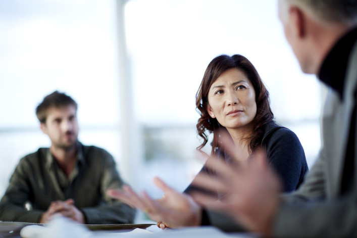 business meeting - woman and two men