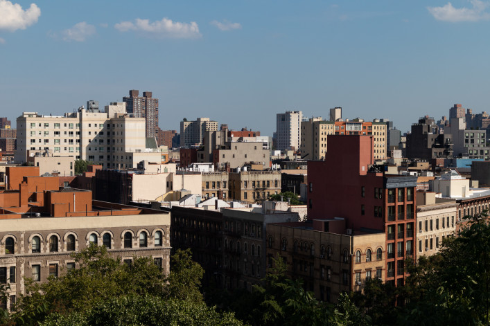 Rooftops of buildings and skyscrapers in the Harlem skyline of New York City