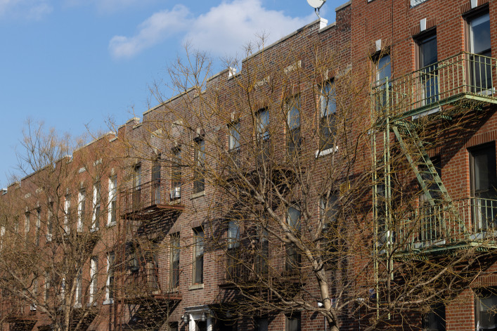 A row of basic and generic old brick apartment buildings with fire escapes along a street in Astoria Queens of New York City Thank you This photo has been successfully downloaded. (Look for it in your Downloads folder or the last place you saved a file.) Having issues? Download again Credit:James Andrews Stock photo ID:1516674990 Upload date:July 08, 2023 Location:United States Categories:Stock Photos|Apartment