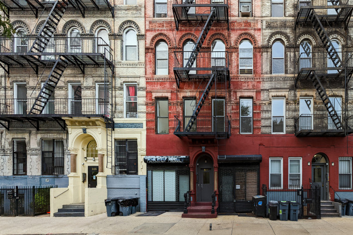 Block of old apartment buildings in the East Village neighborhood of Manhattan in New York City NYC