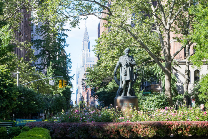 Gramercy Park in Manhattan, NYC with Midtown skyscrapers in the background