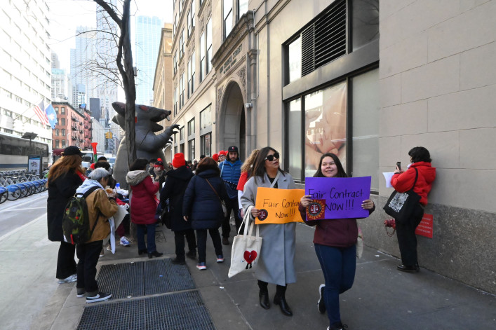 Unionized workers rallied outside of Legal Services NYC’s Manhattan office at 40 Worth St. in February amid contract negotiations. Signs read "Fair Contract Now!!"