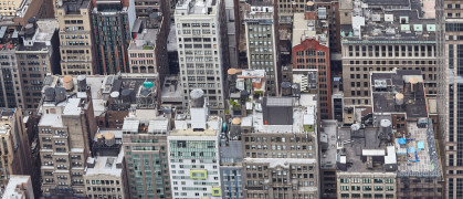 Aerial picture of Manhattan with many rooftop water towers, New York City, USA.