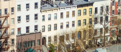 A high angle view of a traditional residential street Hell's Kitchen, Midtown Manhattan in New York City.